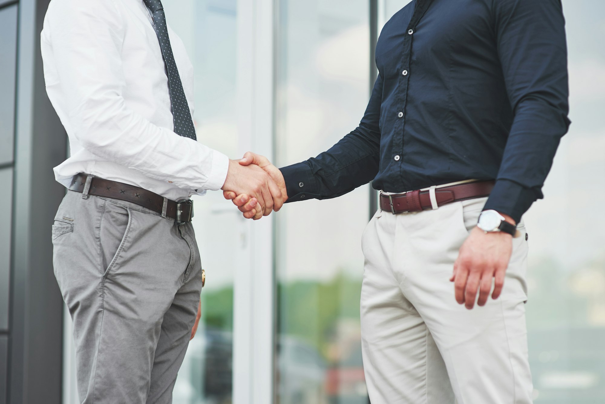 Handshake of two men. Successful business contacts after a good deal
